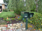 Green multi sized Fort Knox Mailboxes on a custom post