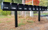 Several Fort Knox Bunker Mailboxes on a steel rack